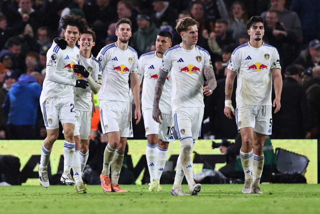Leeds United players celebrate after scoring against Liverpool