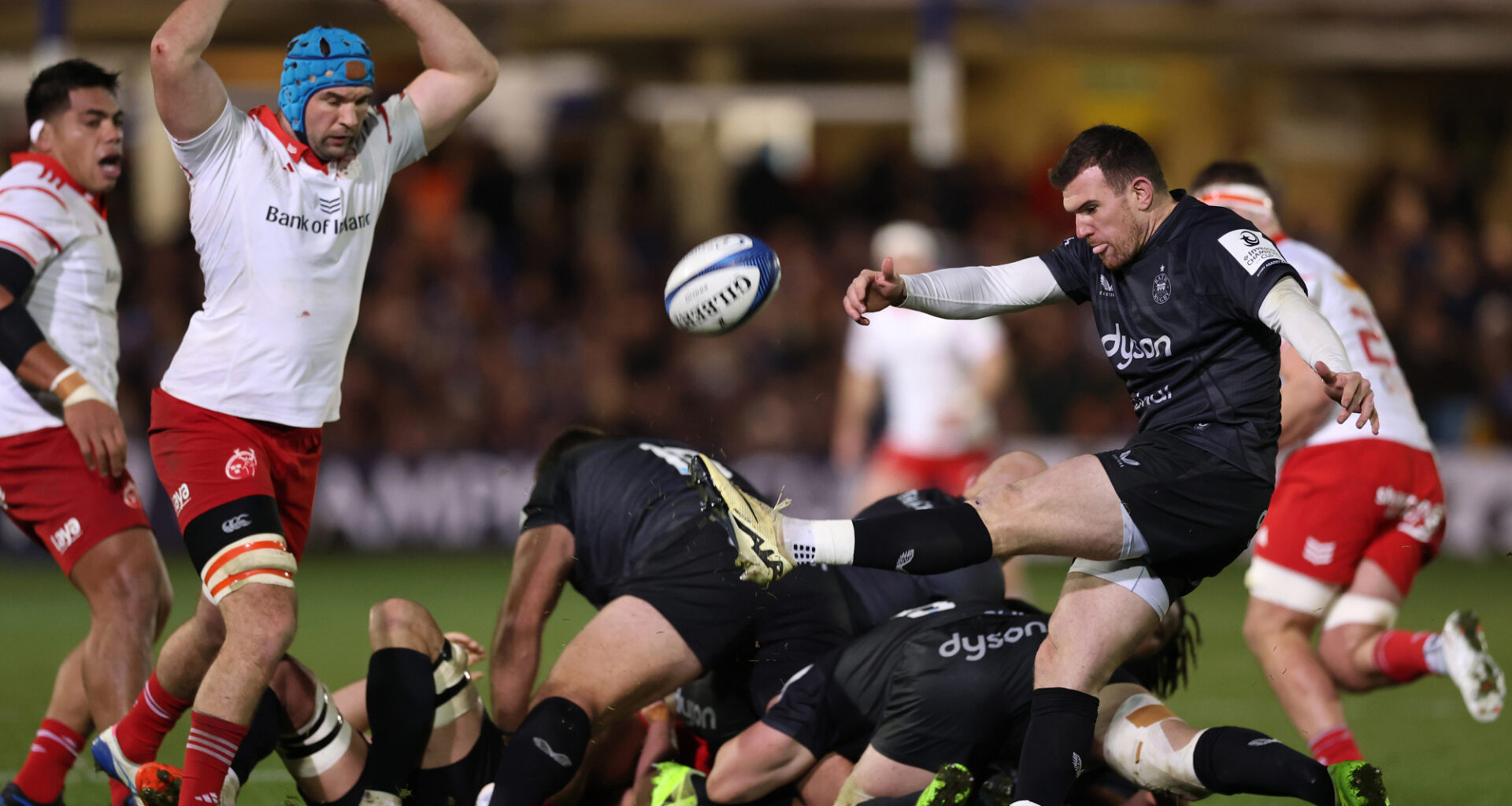 Bath's Ben Spencer kicks the ball during the December 2025 European Champions Cup match against Munster.
