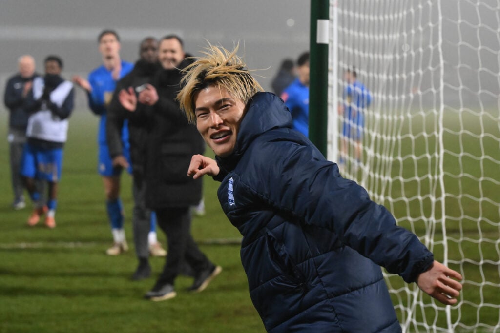 Kyogo Furuhashi celebrates with the Birmingham City fans after FA Cup win over Cambridge United.