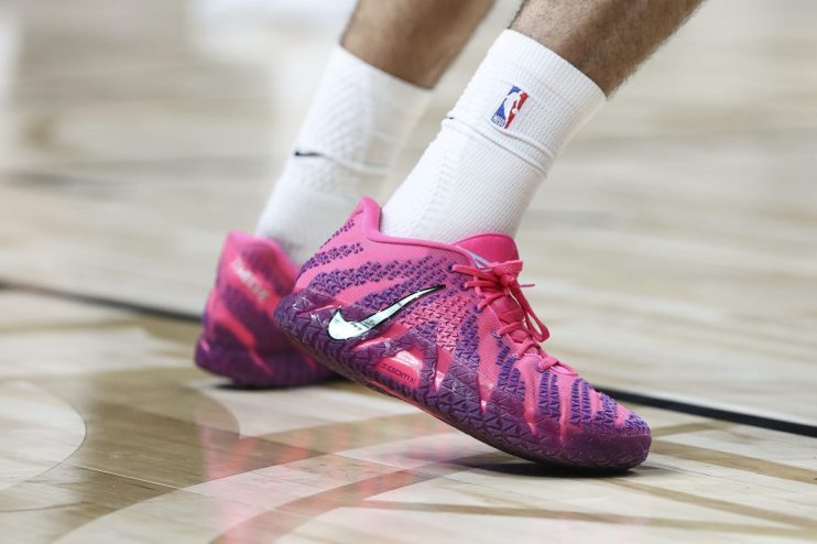 Getty Images logo on office building façade reflecting a modern city skyline at dusk, highlighting corporate presence and...