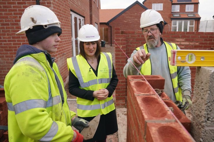 Rachel Reeves at construction site, inspecting housebuilding progress, highlighting Labours commitment to housing developm...