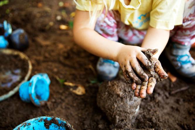 Children playing with mud