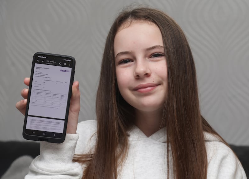 Tasha McCann with her daughter Mia  from North Belfast who receive  her transfer test results.
PICTURE: COLM LENAGHAN