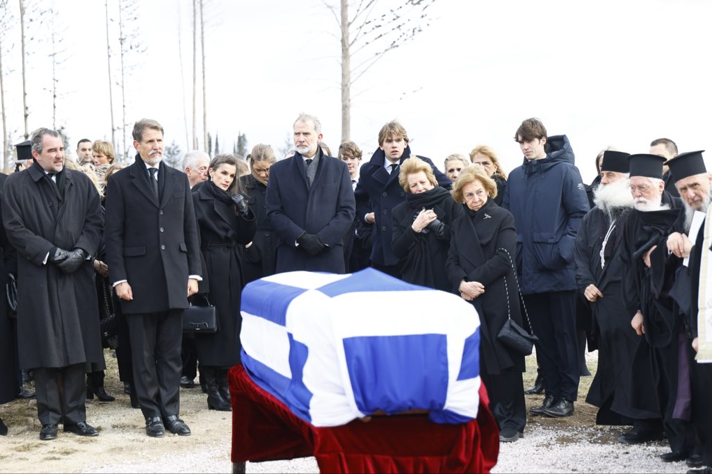 Queen Sofia stands at the coffin of her sister, Princess Irene