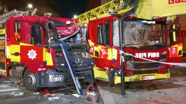Two smashed fire engines after a collision