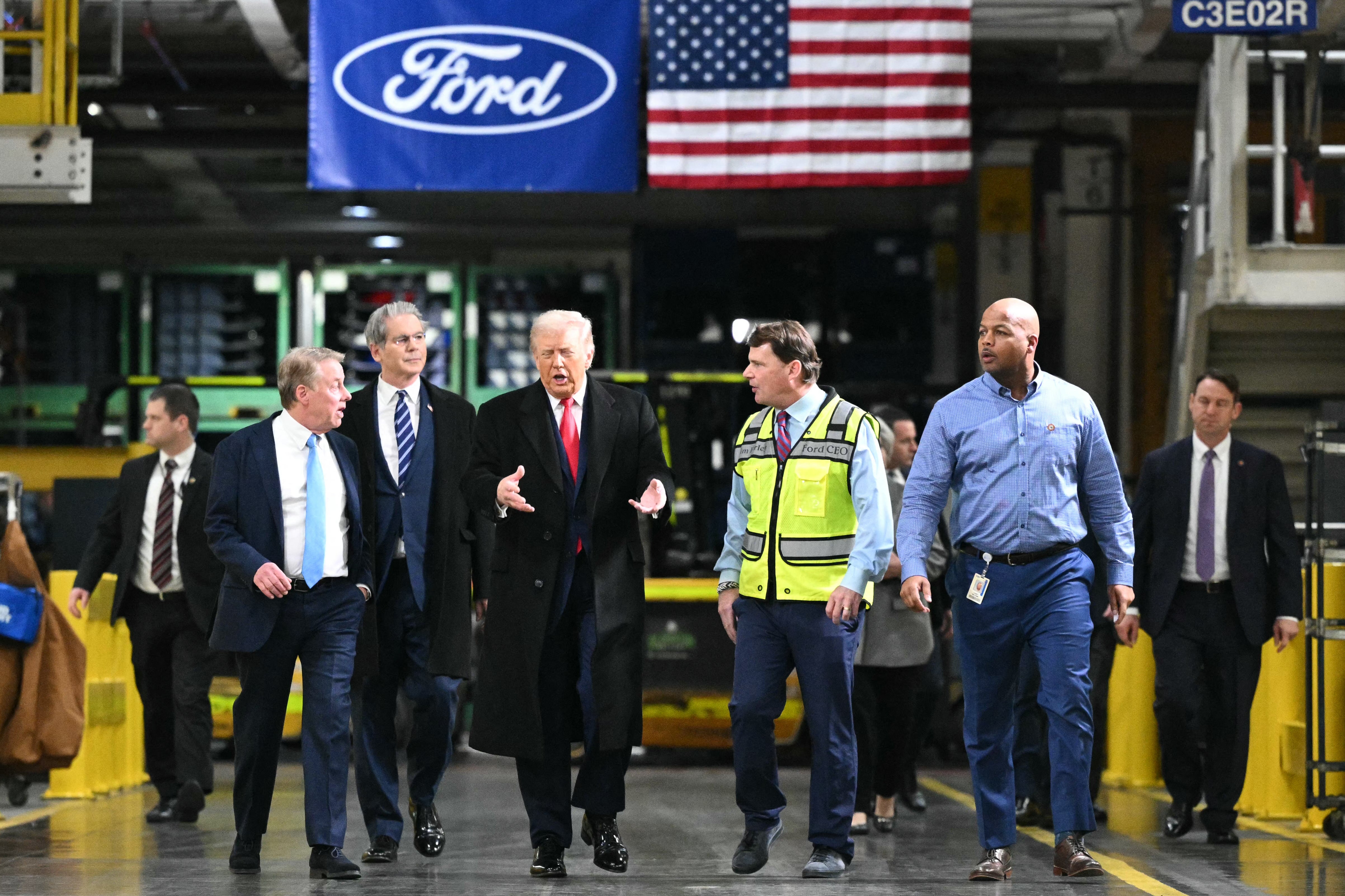 Trump tours the Ford manufacturing floor with executive chairman Bill Ford (far left), Treasury Secretary Scott Bessent (second from left), Ford CEO Jim Farley (second from right) and Corey Williams (far right)