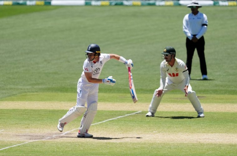 Cricket - The Ashes - Australia v England - Third Test - Adelaide Oval, Adelaide, Australia - December 20, 2025 England's Ollie Pope in action as he hits four runs off the bowling of Australia's Pat Cummins REUTERS/Asanka Brendon Ratnayake