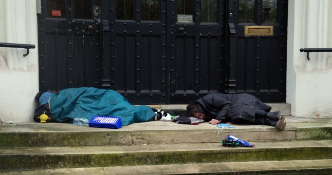 LONDON, ENGLAND - MAY 6: Homeless people sleep on a doorstep on May 6, 2024 in London, England. The early May Day bank holiday was inaugurated in the UK in 1978 but dates back to 1890 when it became associated with International Workers' Day and labour protests. (Photo by Carl Court/Getty Images)