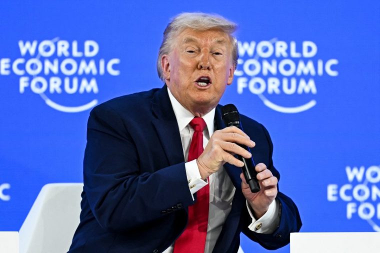 US President Donald Trump speaks during the World Economic Forum (WEF) annual meeting in Davos on January 21, 2026. The World Economic Forum takes place in Davos from January 19 to January 23, 2026. (Photo by Fabrice COFFRINI / AFP via Getty Images)