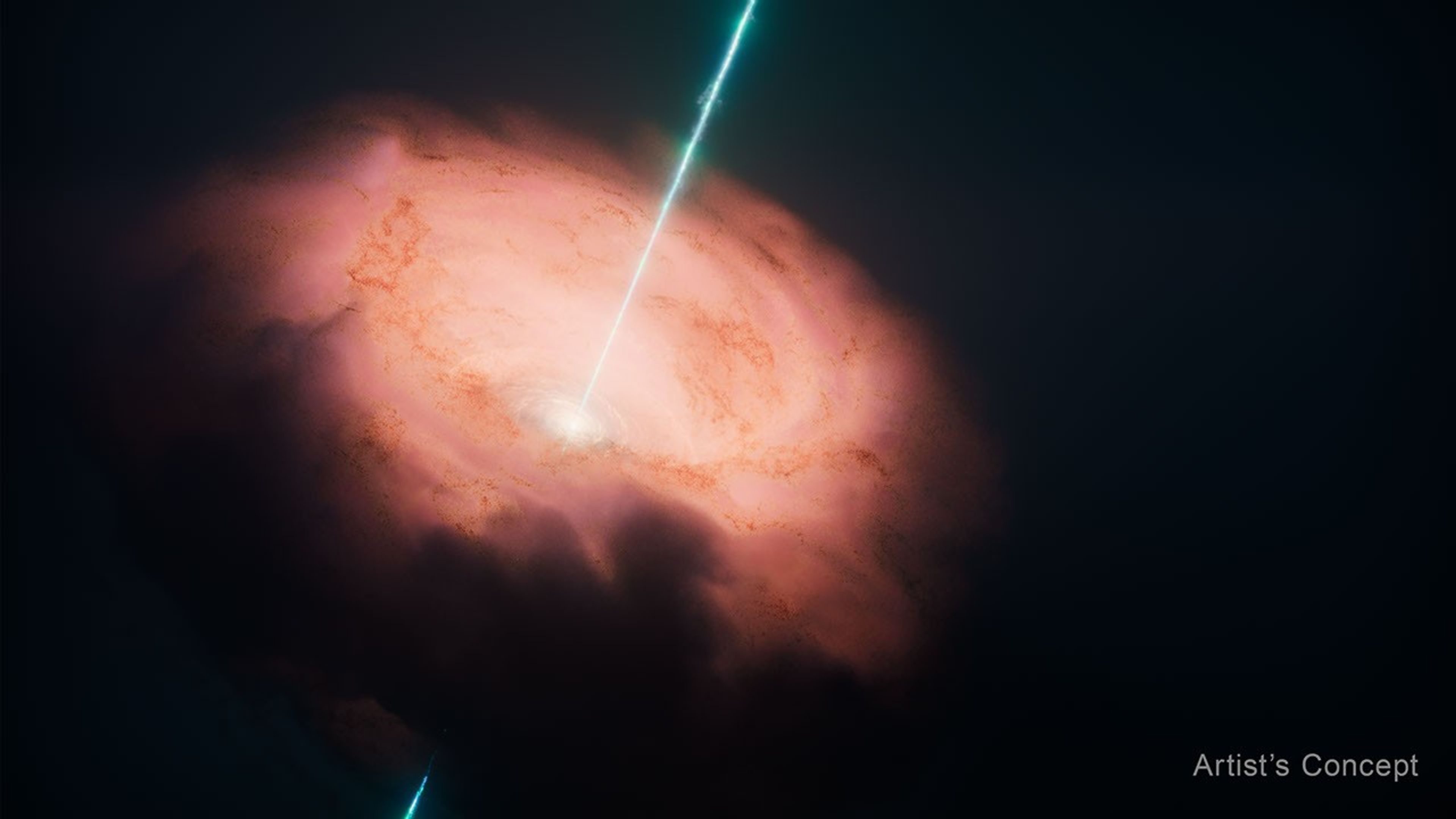 An artist’s illustration showing the center of the Circinus galaxy, including its supermassive black hole, dusty torus, and superheated jets of matter. The center of supermassive black hole, slightly left of center, is bright white. Two slim, bright green jets of matter shoot out from the black hole at 1 o’clock and 7 o’clock, and hit the edges of the frame. A donut-shaped, orangish-pinkish ring of dust and gas, called a torus, surrounds the black hole. The disk is clumpy closer to the center and more diffuse at the edges. The torus, tilted at the same angle as the jets, is brighter and whiter closer to the black hole than at the edges. The words Artist’s Concept is in the lower right corner.