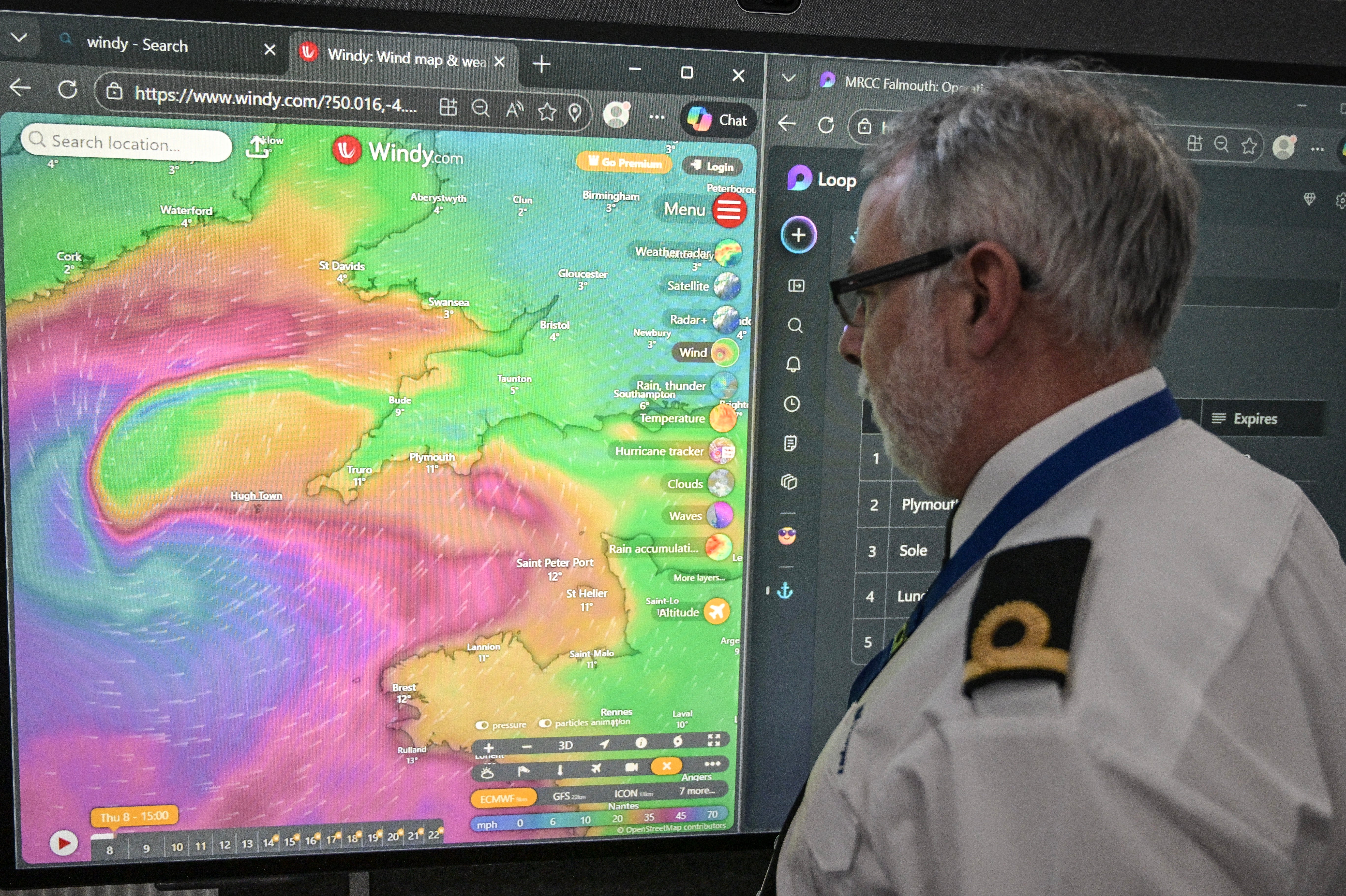 An officer at the Falmouth Maritime Rescue Co-ordination Centre monitors the progress of Storm Goretti