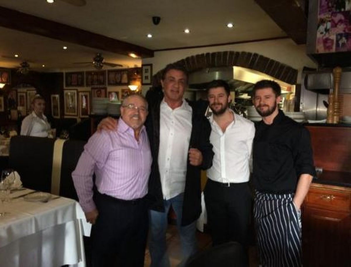 Sylvester Stallone at Puccini with owner Michele Pucci and his two sons