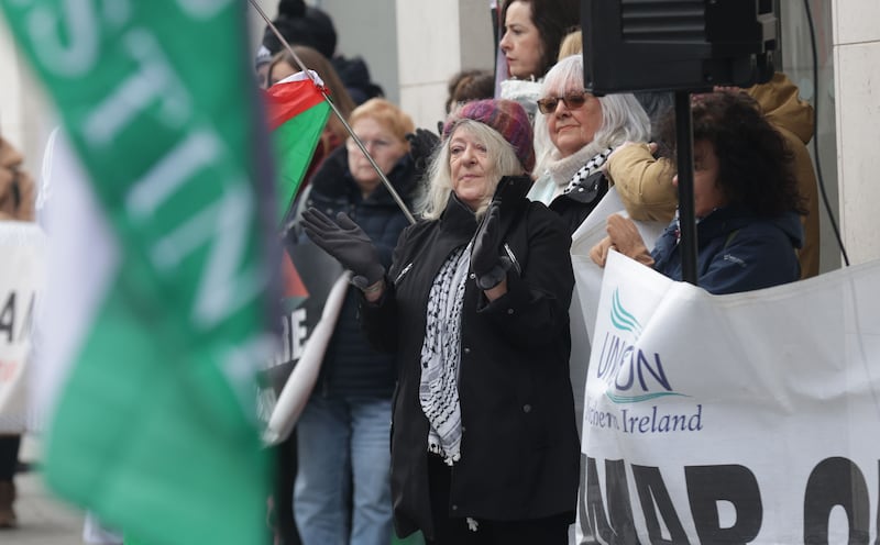 Ireland Palestine Solidarity Campaign during a vigil from Writers square to Erskine on New Years Eve.
PICTURE COLM LENAGHAN