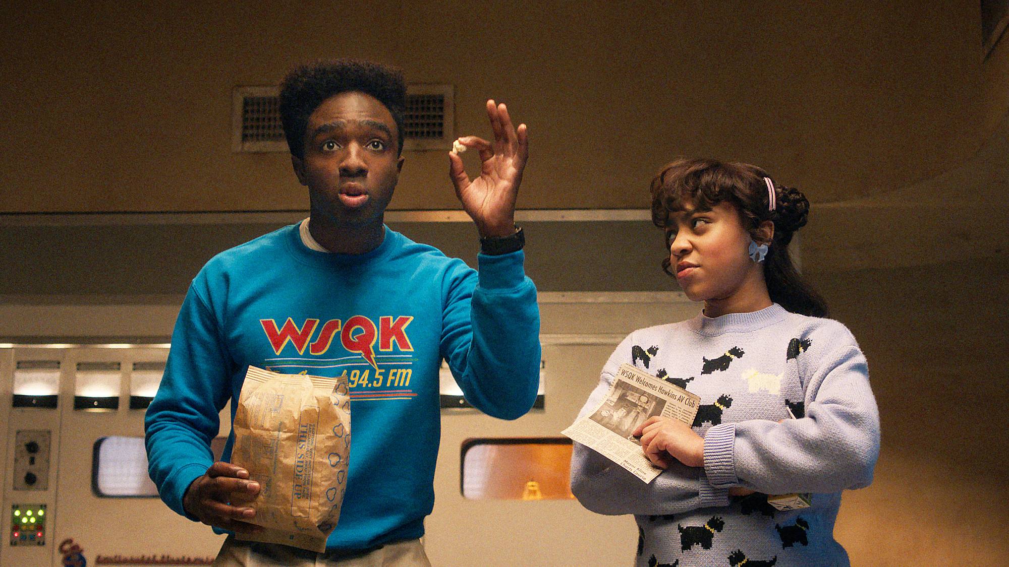 Caleb McLaughlin as Lucas Sinclair and Priah Ferguson as Erica Sinclair in "Stranger Things" season 5 part 2