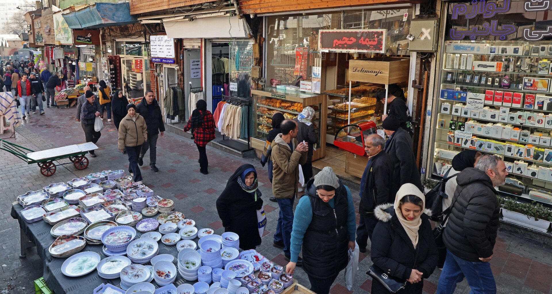 Iran delegates import powers as US war threats keep economy unstable | Politics News