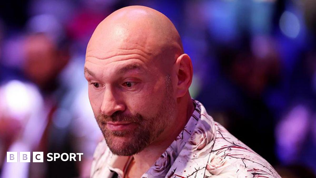 Luke Littler celebrates winning the 2026 PDC World Championship as tickertape falls