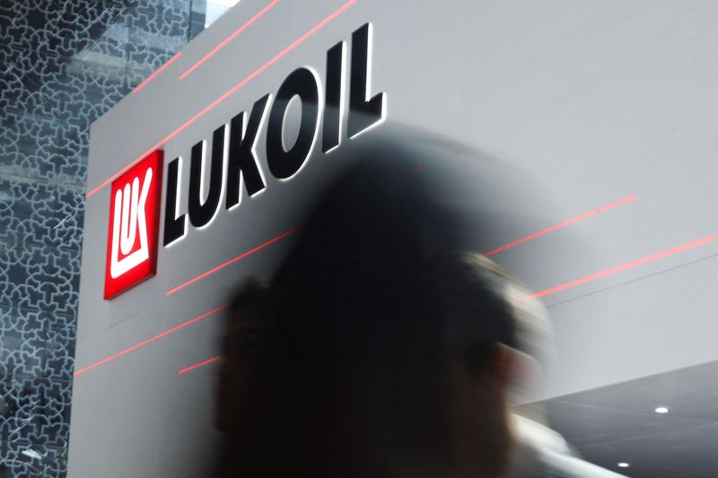 Russia's Lukoil agrees to sell international assets to Carlyle