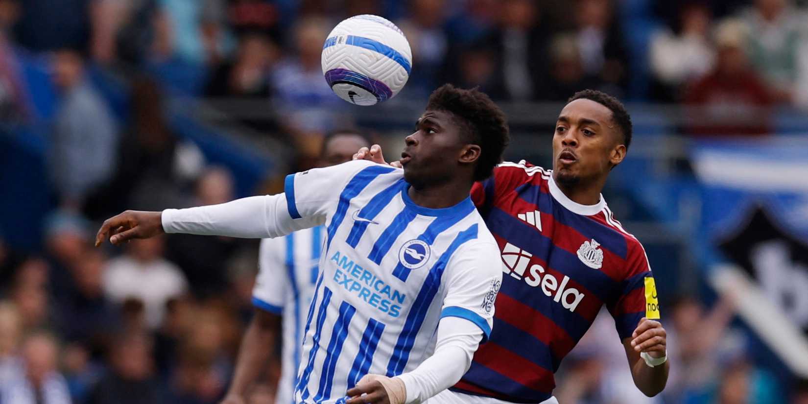 Brighton & Hove Albion's Carlos Baleba in action with Newcastle United's Joe Willock