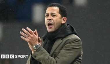 Ruud Gullit posing with the 1997 FA Cup trophy