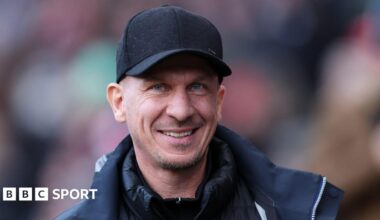 A close up of Bristol City boss Gerhard Struber wearing a black cap