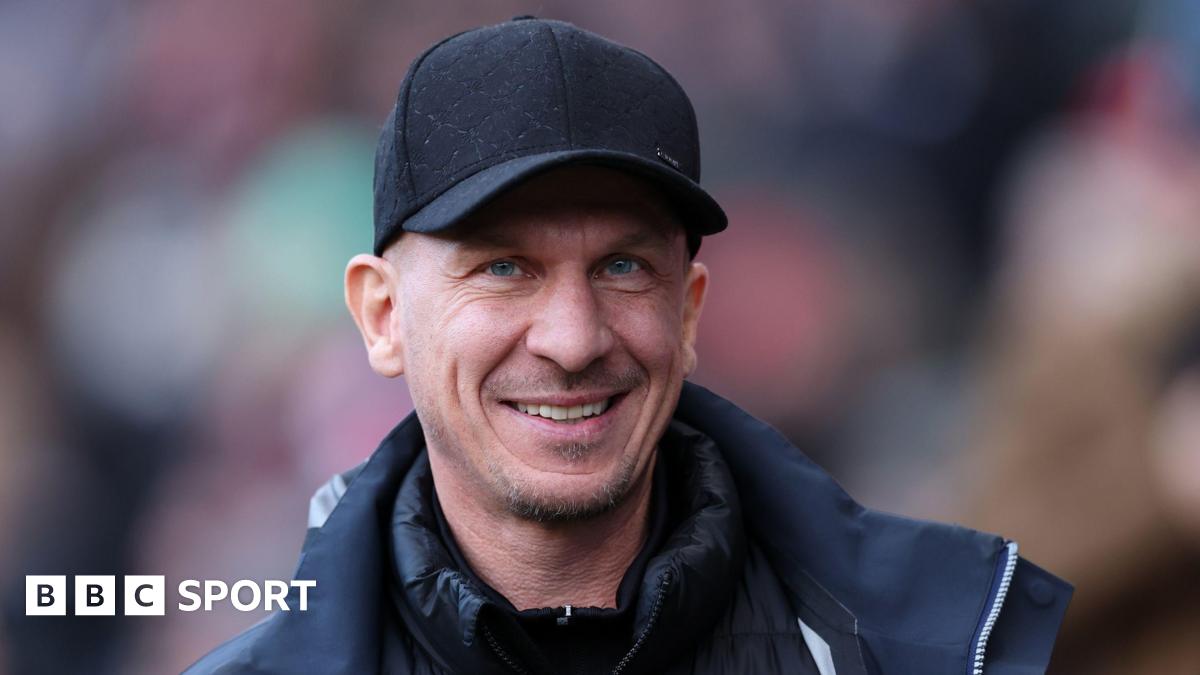 A close up of Bristol City boss Gerhard Struber wearing a black cap