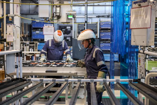 A production line for the Peugeot e-3008 electric car, at the Stellantis factory in Sochaux, eastern France, on September 12, 2023.