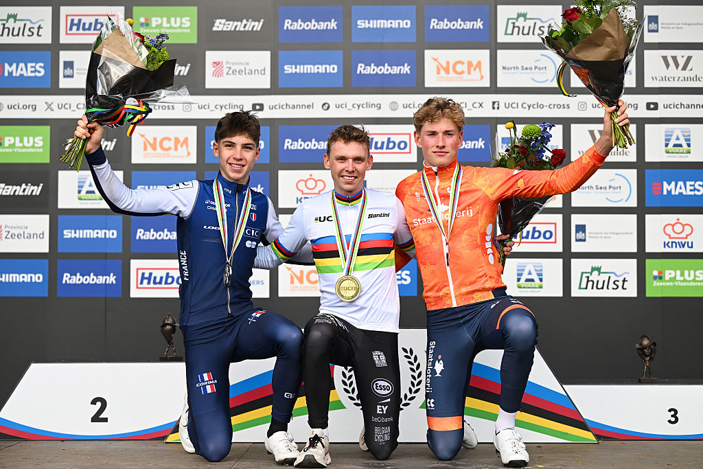 HULST, NETHERLANDS - JANUARY 31: (L-R) Silver medalist Aubin Sparfel and Team France, gold medalist Aaron Dockx and Team Belgium and bronze medalist Keije Solen and Team Netherlands pose on the podium during the medal ceremony after the 77th UCI Cyclo-Cross World Championships 2026 - Men&amp;apos;s U23 on January 31, 2026 in Hulst, Netherlands. (Photo by Luc Claessen/Getty Images)