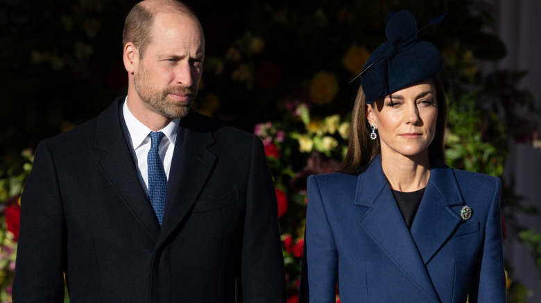 Prince William and Princess Catherine dark blue coat and hat