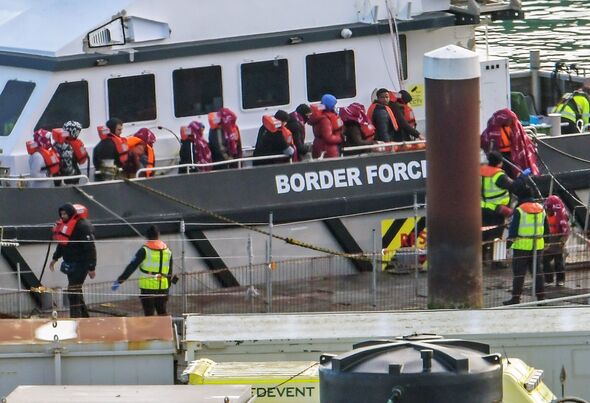 Border Force escorts migrants into Dover Border Force escorts migrants into Dover