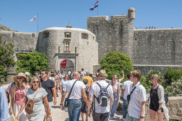 Dubrovnik, Croatia, Walled City, Pile Gate drawbridge, with crowds of tourists Dubrovnik, Croatia, Walled City, Pile Gate drawbridge, with crowds of tourists