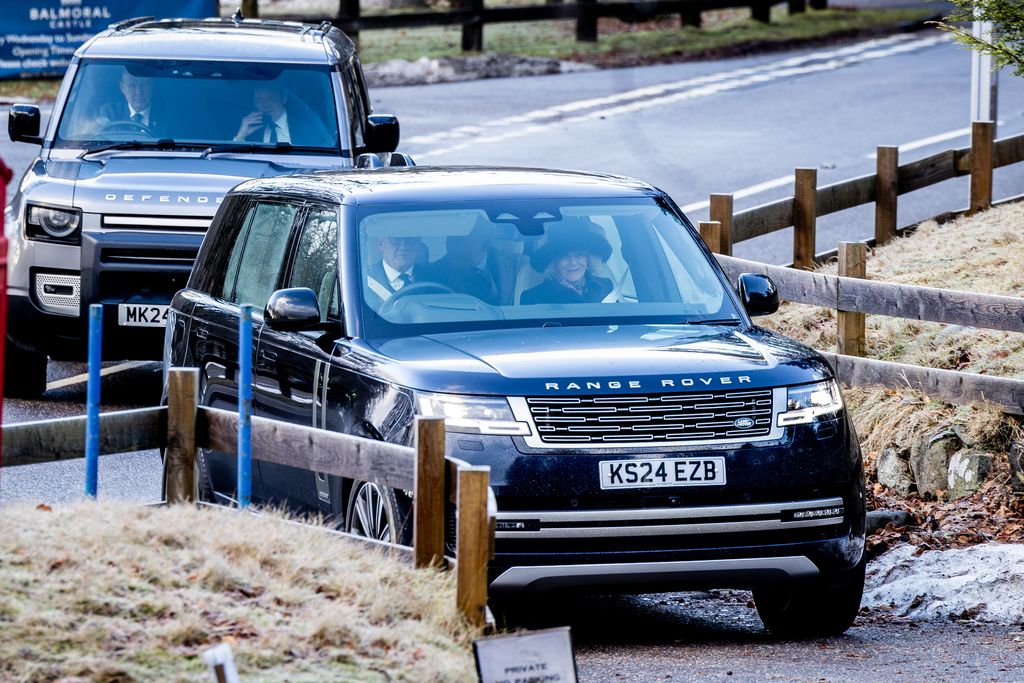 King Charles III and Queen Camilla arriving by car 