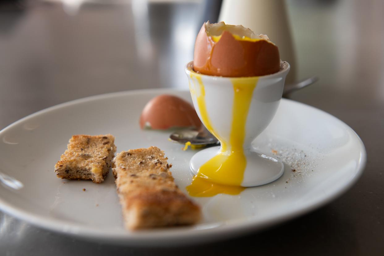 Runny boiled eggs and toast soldiers for breakfast