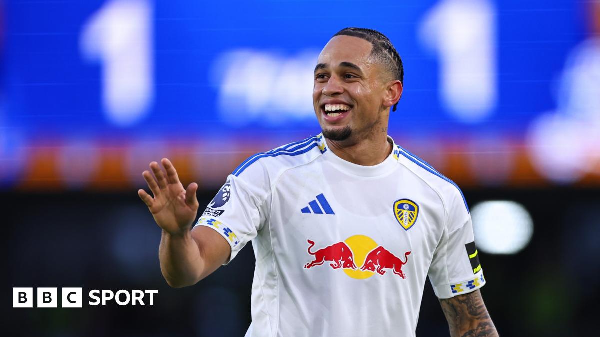 Noah Okafor smiles and acknowledges fans