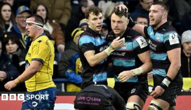 Jack Dempsey celebrates with his Glasgow teammates Jamie Dobie and Matt Fagerson during the Warriors' Champions Cup victory over Clermont Auvergne