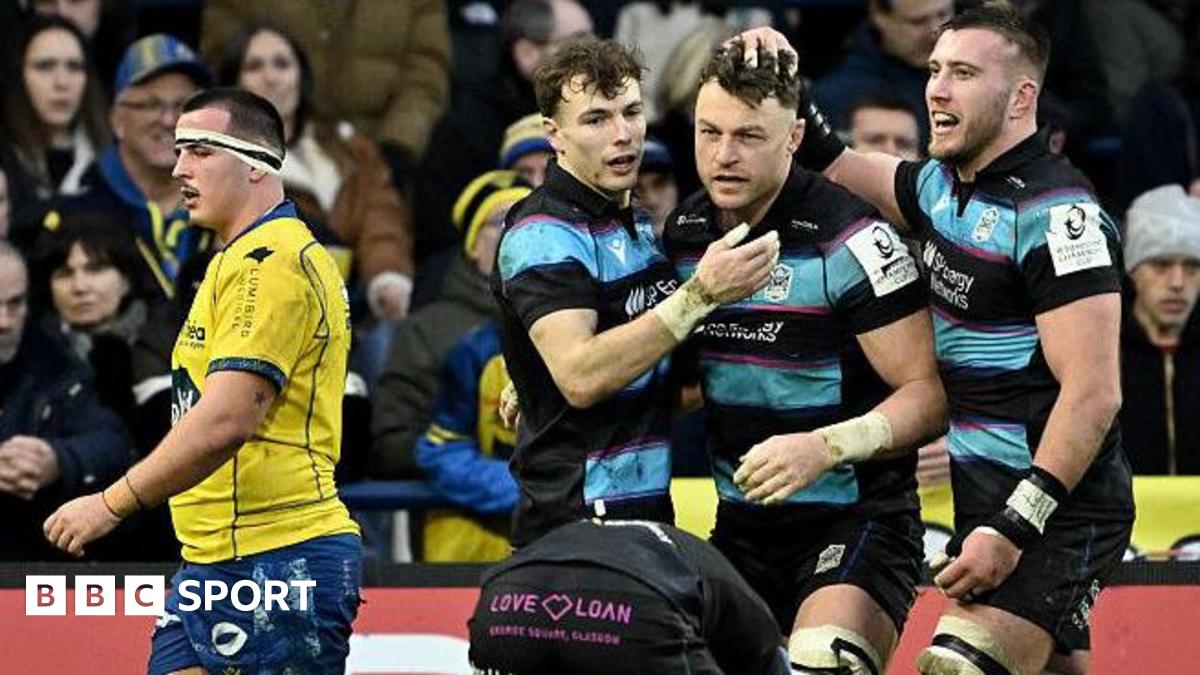Jack Dempsey celebrates with his Glasgow teammates Jamie Dobie and Matt Fagerson during the Warriors' Champions Cup victory over Clermont Auvergne