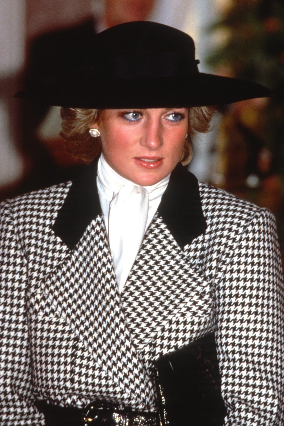 munich, germany november 04: diana, princess of wales, wearing a black and white houndstooth check suit designed by alistair blair and a black hat designed by philip somerville, attends a reception at the new town hall on november 4, 1987 in munich, germany. (photo by anwar hussein/getty images) munich, germany november 04: diana, princess of wales, wearing a black and white houndstooth check suit designed by alistair blair and a black hat designed by philip somerville, attends a reception at the new town hall on november 4, 1987 in munich, germany. (photo by anwar hussein/getty images)