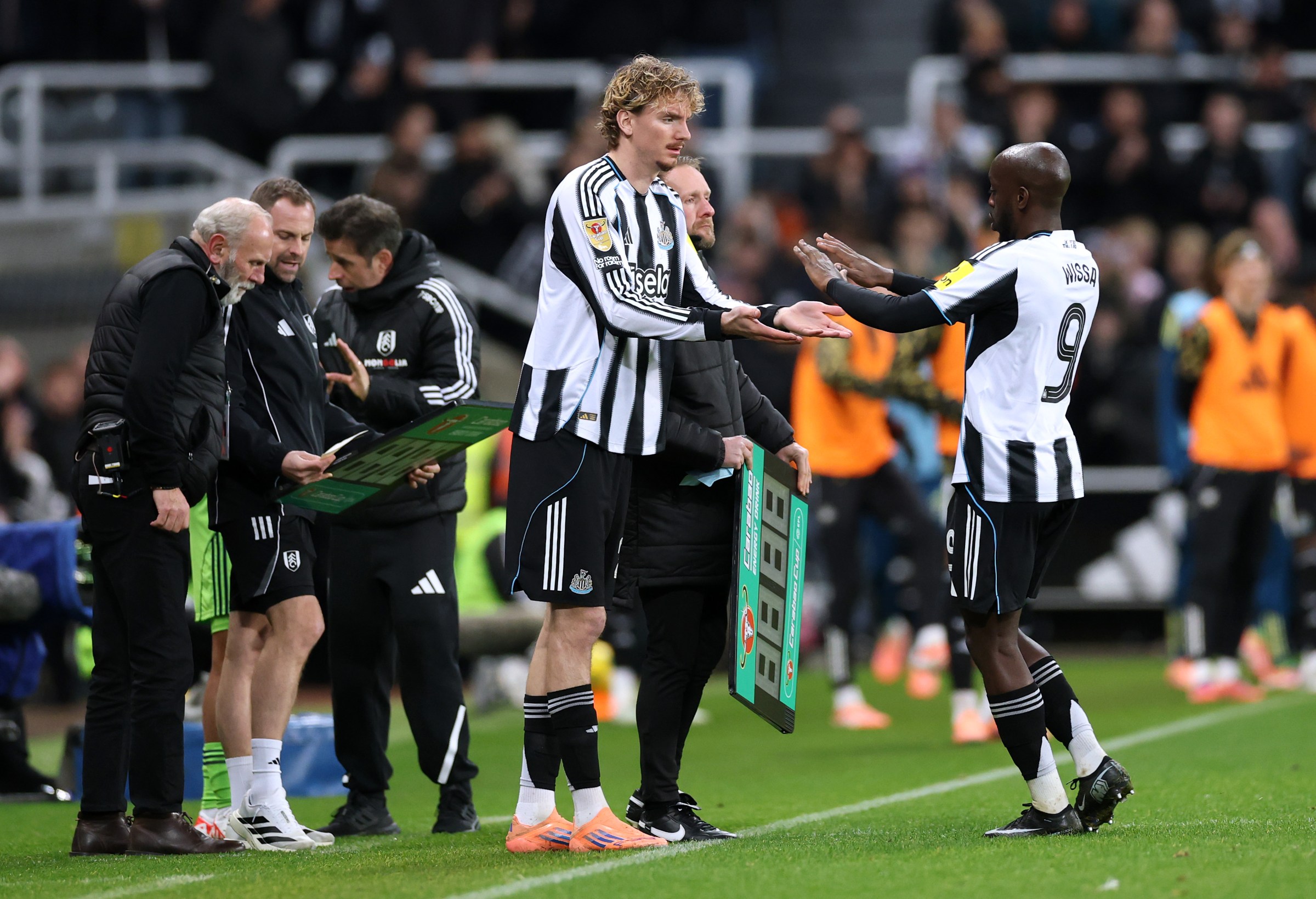 NEWCASTLE UPON TYNE, ENGLAND - DECEMBER 17: Yoane Wissa of Newcastle United is replaced as a substitute by Nick Woltemade during the Carabao Cup Quarter Final match between Newcastle United and Fulham at St James’ Park on December 17, 2025 in Newcastle upon Tyne, England. (Photo by Stu Forster/Getty Images)