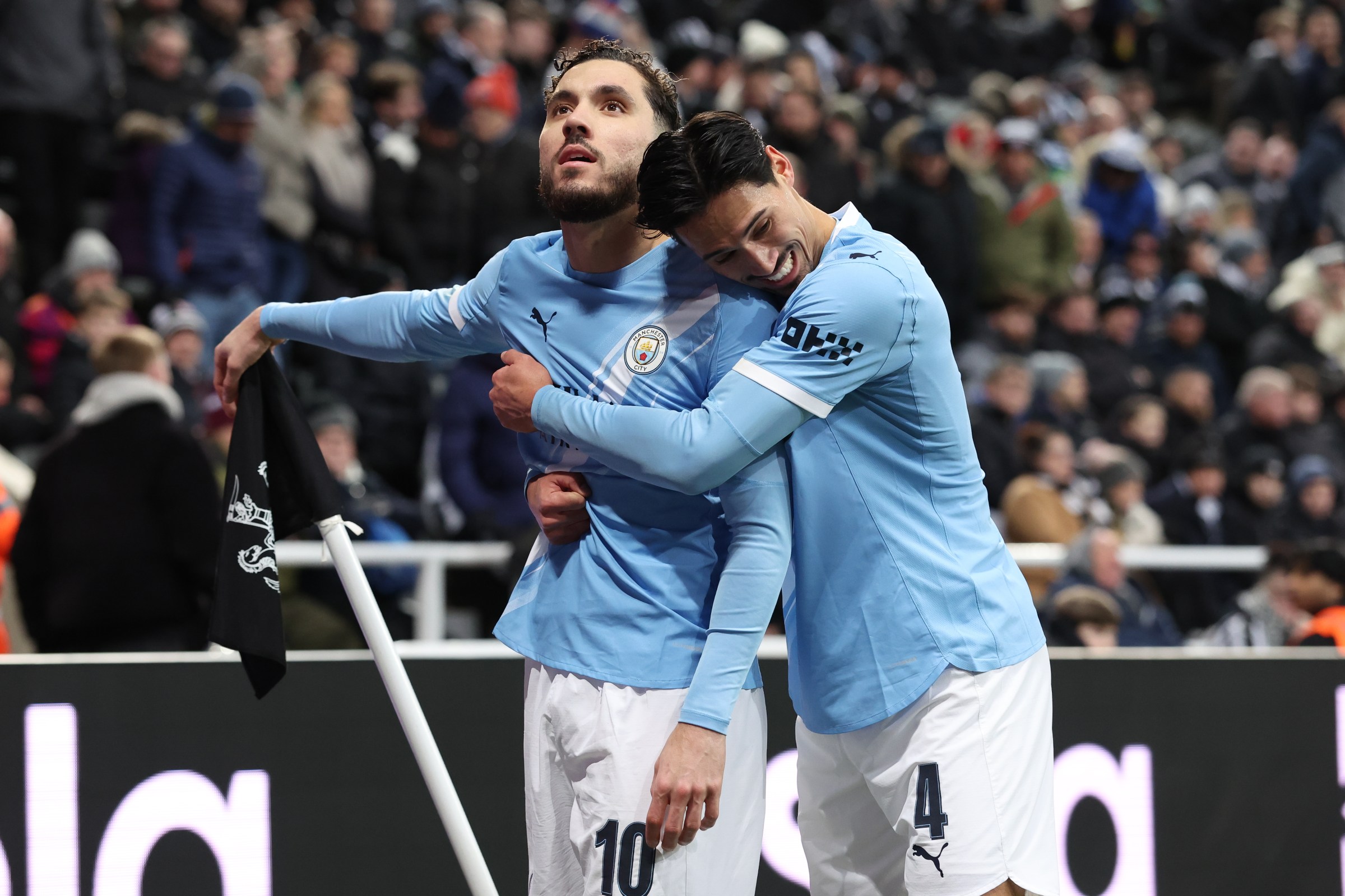 NEWCASTLE UPON TYNE, ENGLAND - JANUARY 13: Rayan Cherki of Manchester City celebrates after scoring their side’s second goal during the Carabao Cup Semi Final First Leg match between Newcastle United and Manchester City at St James’ Park on January 13, 2026 in Newcastle upon Tyne, England. (Photo by Alex Livesey - Danehouse/Getty Images)