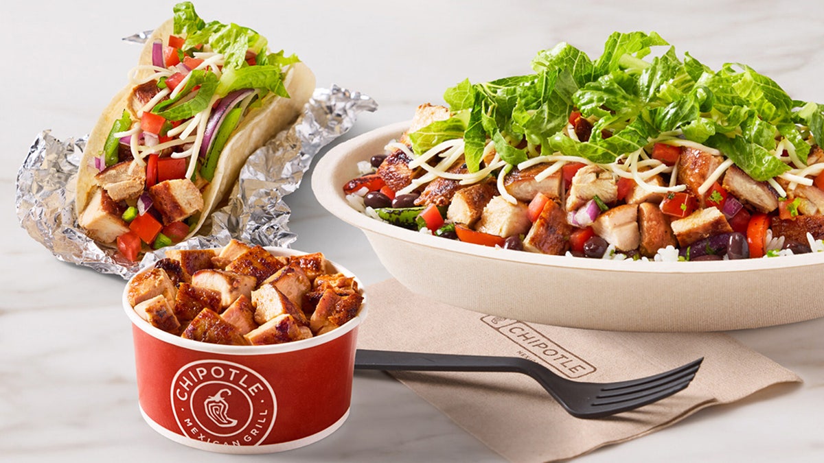 Bowl, taco and chicken cup from Chipotle's new High Protein Menu.