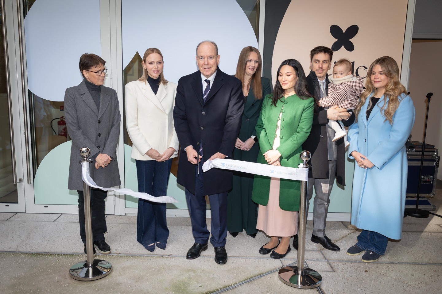 Princess Charlene, Prince Albert, Princess Stephanie, Camille Gottlieb, Louis and Mraie Ducruet cutting a ribbon