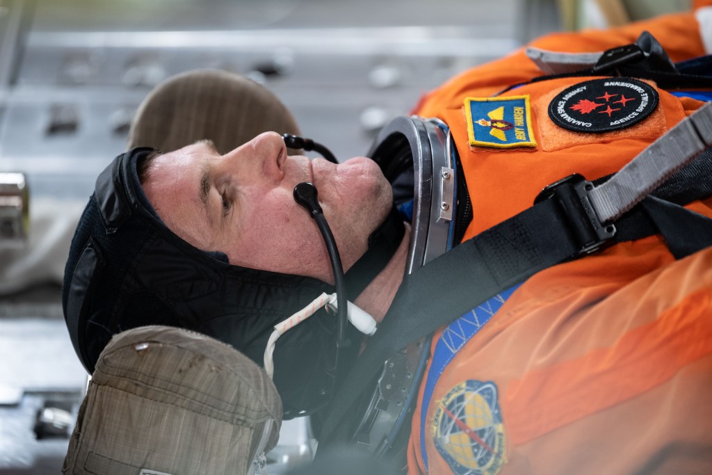 Canadian Space Agency astronaut and Artemis II mission specialist Jeremy Hansen inside of the Orion spacecraft mockup during Post Insertion and Deorbit Preparation training at the Space Vehicle Mockup Facility in Houston, Texas. The crew practiced getting the Orion spacecraft configured once in orbit, how to make it habitable, and suited up in their entry pressure suits to prepare for their return from the Moon.