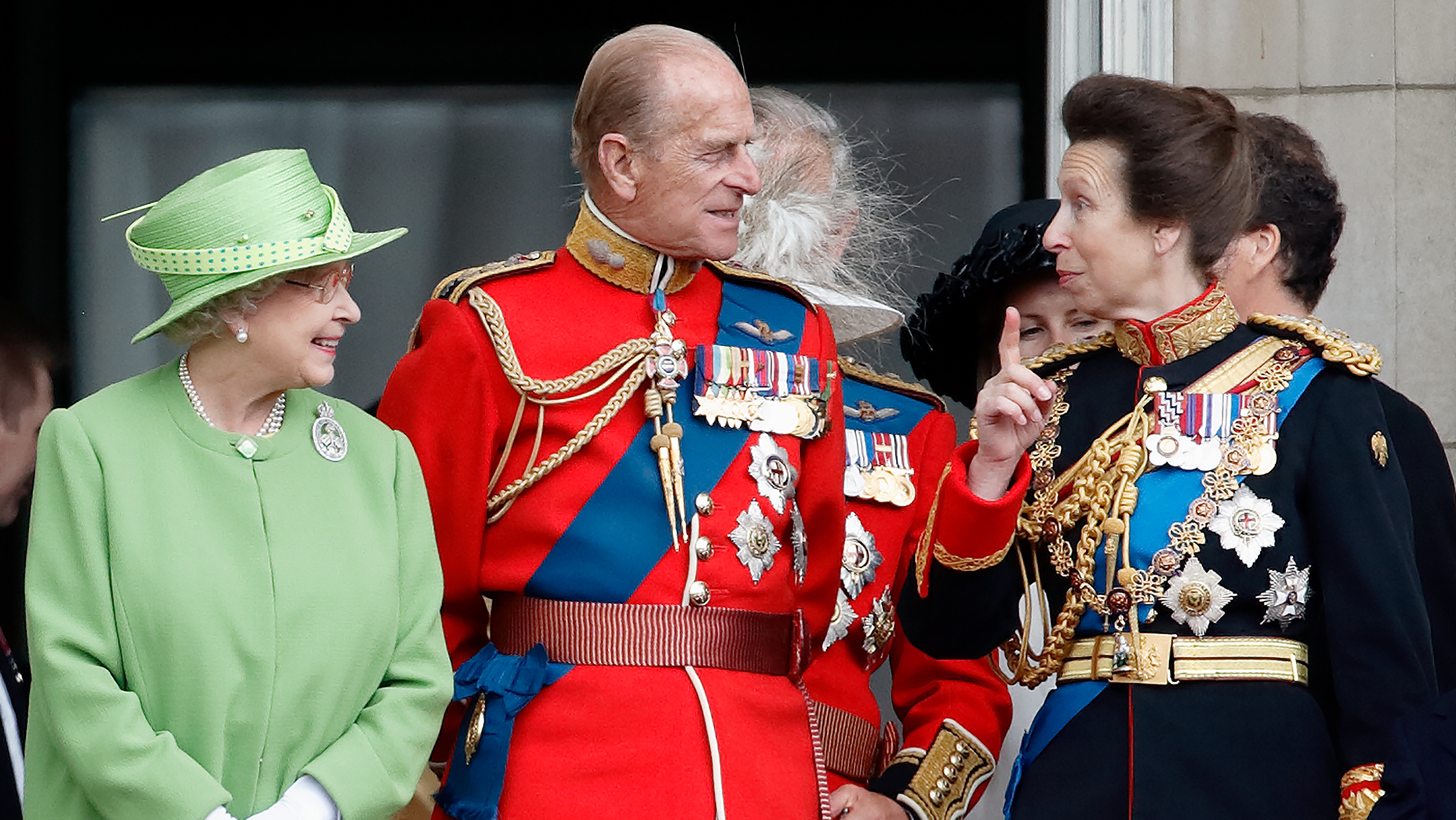 Queen Elizabeth II, Prince Philip and Princess Anne, Princess Royal watch a flypast from the balcony of Buckingham Palace during the annual Trooping the Colour Parade on June 16, 2007