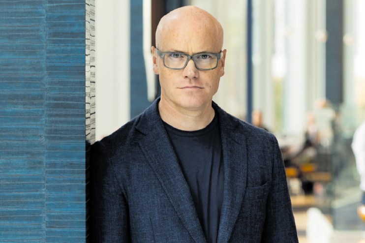 An elegant dining setting at a classic London restaurant, showcasing fine tableware and a warm, inviting ambiance.