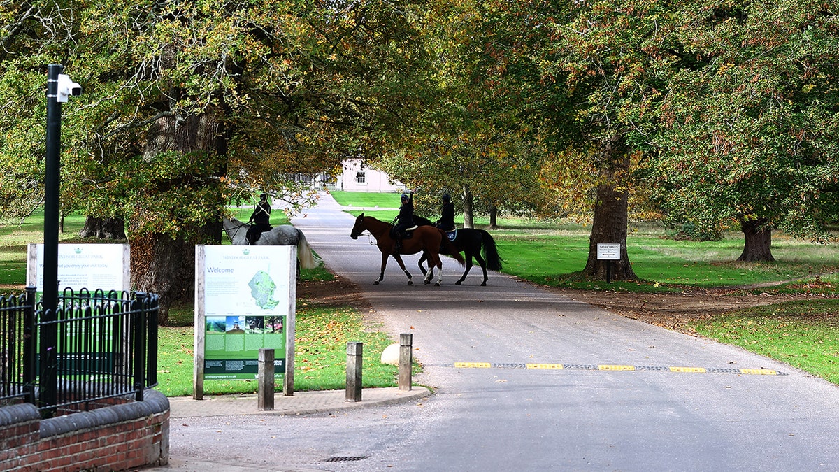Men on horseback near Royal Lodge.