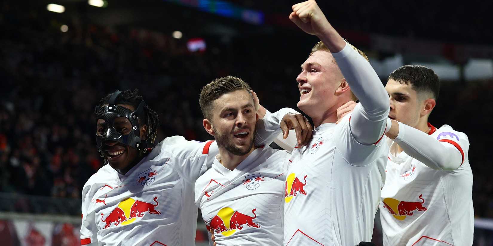 RB Leipzig's Christoph Baumgartner celebrates scoring their second goal with Yan Diomande, Conrad Harder and Kosta Nedeljkovic