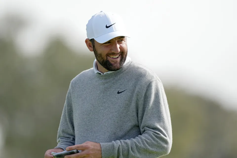 Scottie Scheffler of the United States reacts after chipping in for eagle from the bunker on the sixth hole during the second round of The Genesis Invitational 2025 at Torrey Pines Golf Course on February 14, 2025