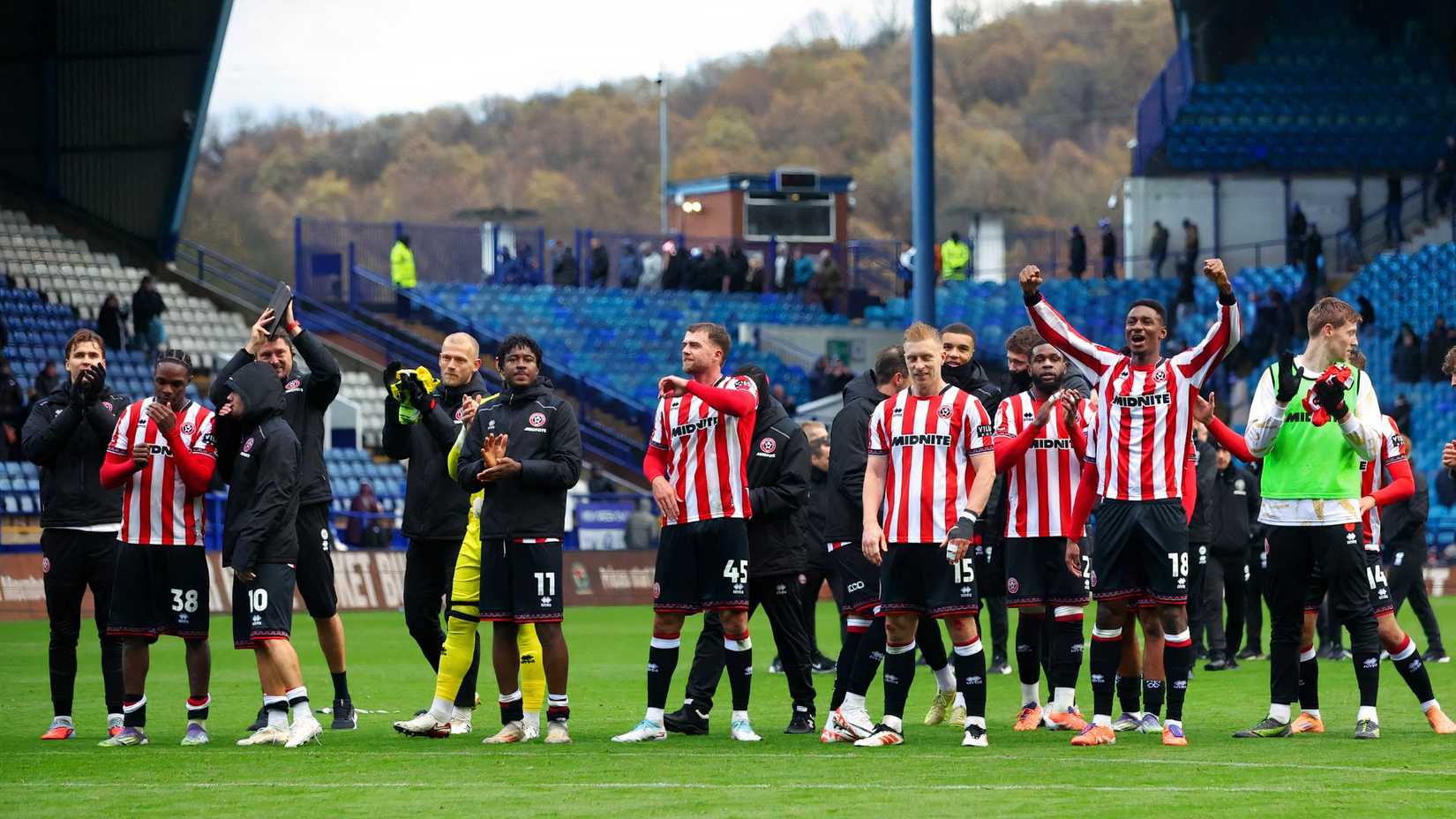 Sheffield United players celebrate beating Sheffield Wednesday at Hillsborough