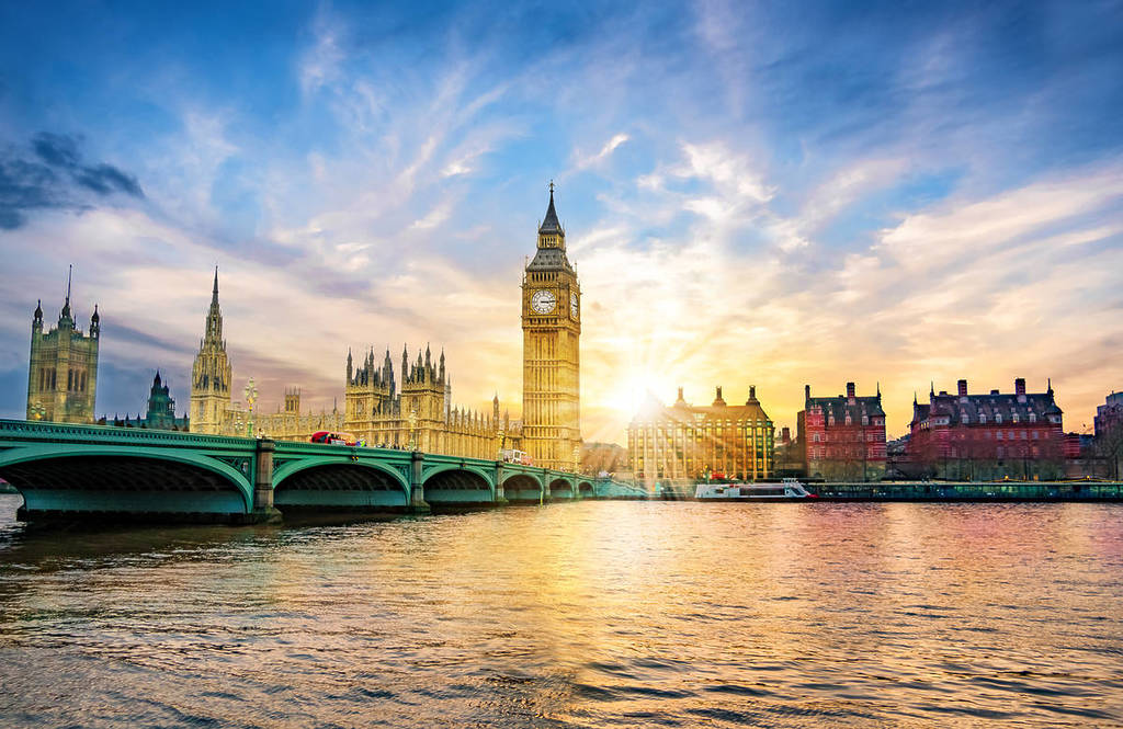 London cityscape with the Big Ben and City of Westminster Abbey bridge in sunset light
