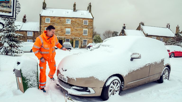 Snow covers a car in Lythe, North Yorkshire, on Saturday. But today, other drivers could face flat batteries. Pic: PA