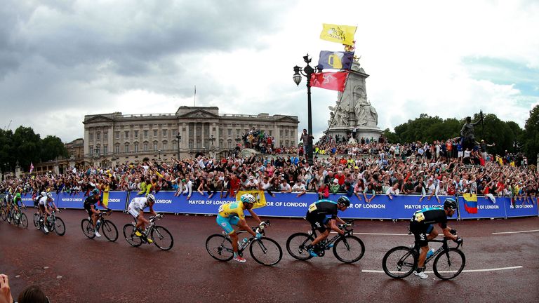 Chris Froome, second right, passing Buckingham Palace during the Tour de France in London in 2014. Pic: PA
